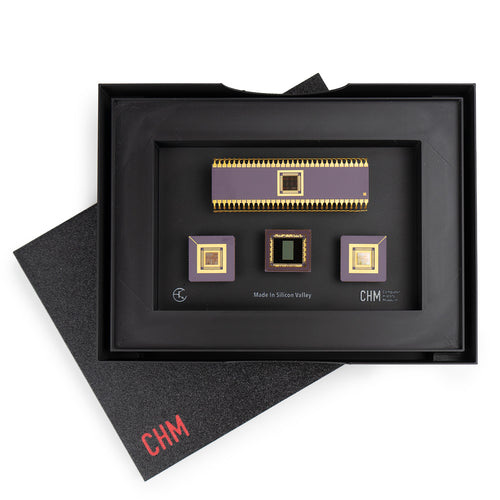 Framed display of electronic components with 'CHM' branding on a white background